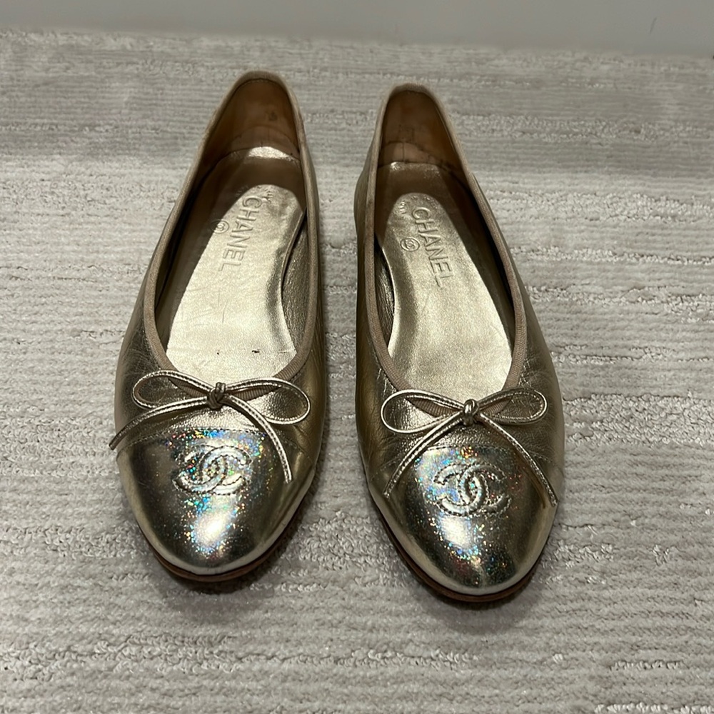 Gold Chanel ballet flats